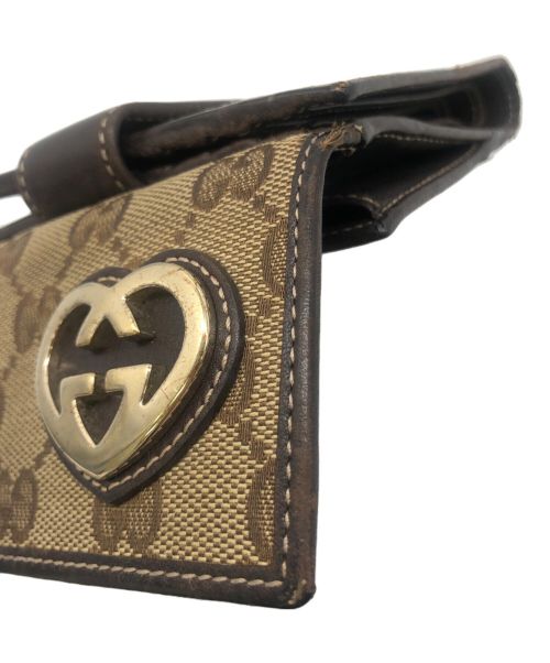GUCCI（グッチ）GUCCI (グッチ) ラブリーハート Wホック 二つ折り財布の古着・服飾アイテム