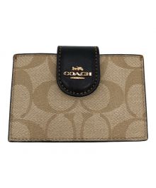 COACH（コーチ）の古着「アコーディオン カード ケース ブロックド シグネチャー キャンバス」
