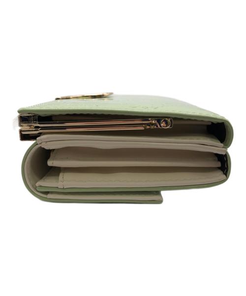 Clelia（クレリア）clelia (クレリア) がま口×フラップエナメル長財布 黄緑 未使用品の古着・服飾アイテム