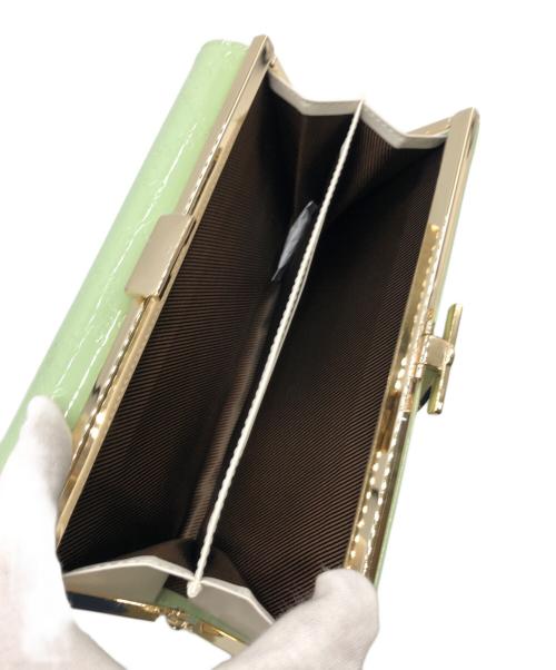 Clelia（クレリア）clelia (クレリア) がま口×フラップエナメル長財布 黄緑 未使用品の古着・服飾アイテム