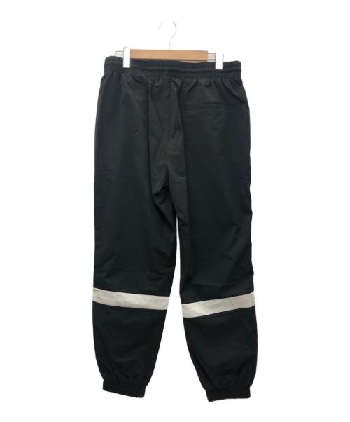 New Era（ニューエラ）New Era (ニューエラ) オーバーサイズド パイピング トラックパンツ ブラック サイズ:L 未使用品の古着・服飾アイテム