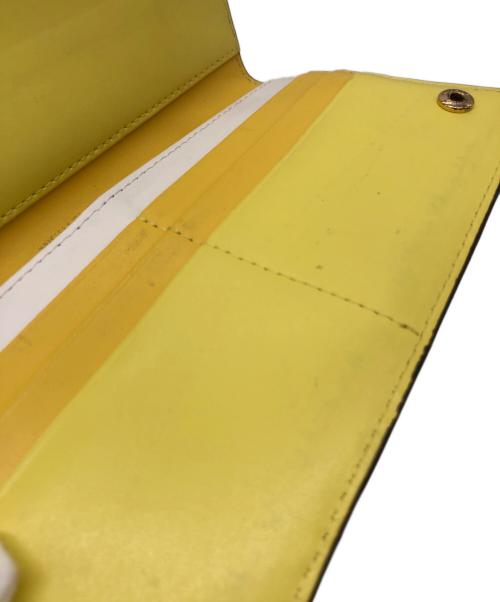 MICHAEL KORS（マイケル・コース）MICHAEL KORS (マイケルコース) 長財布　キャリーオール イエローの古着・服飾アイテム