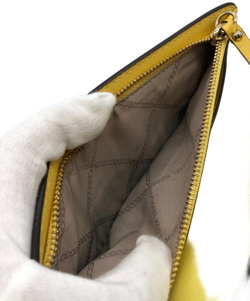 MICHAEL KORS（マイケル・コース）MICHAEL KORS (マイケルコース) 長財布　キャリーオール イエローの古着・服飾アイテム