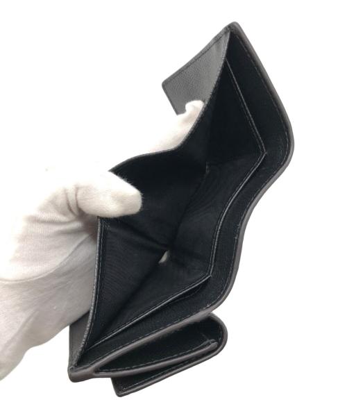 FURLA（フルラ）FURLA (フルラ) Camelia S Compact Wallet Trifold（カメリアSコンパクトウォレット トライフォールド） ブラックの古着・服飾アイテム