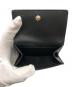 中古・古着 FURLA (フルラ) Camelia S Compact Wallet Trifold（カメリアSコンパクトウォレット トライフォールド） ブラック：6000円