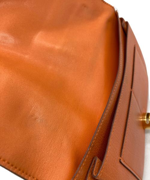 HERMES（エルメス）HERMES (エルメス) 長財布 オレンジの古着・服飾アイテム