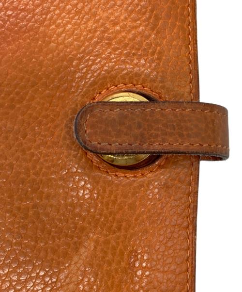 HERMES（エルメス）HERMES (エルメス) 長財布 オレンジの古着・服飾アイテム