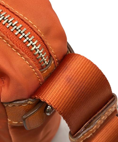 TUMI（トゥミ）TUMI (トゥミ) ショルダーバッグ オレンジの古着・服飾アイテム