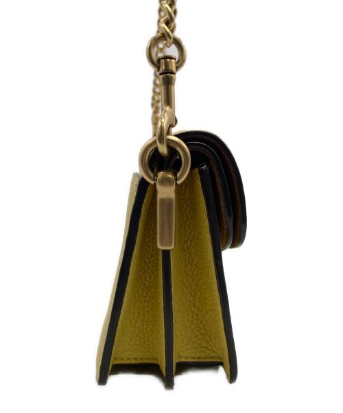 COACH（コーチ）COACH (コーチ) タビーチェーンクラッチ イエローの古着・服飾アイテム