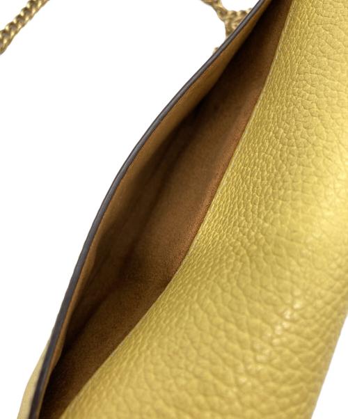 COACH（コーチ）COACH (コーチ) タビーチェーンクラッチ イエローの古着・服飾アイテム