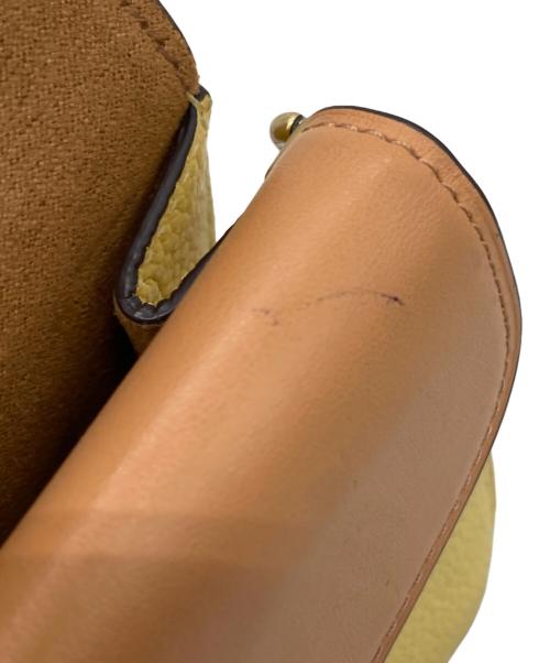 COACH（コーチ）COACH (コーチ) タビーチェーンクラッチ イエローの古着・服飾アイテム