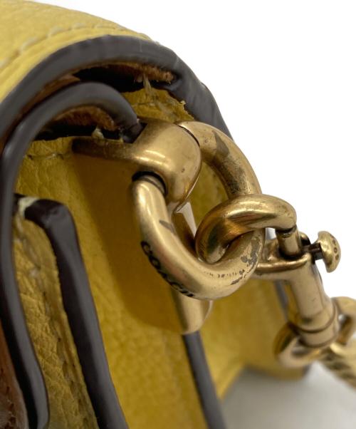 COACH（コーチ）COACH (コーチ) タビーチェーンクラッチ イエローの古着・服飾アイテム