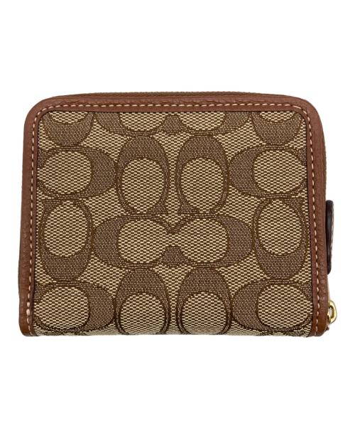 COACH（コーチ）COACH (コーチ) DISNEY (ディズニー) スモール ジップ アラウンド ウォレットの古着・服飾アイテム