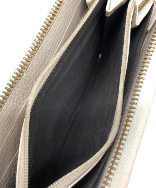 GUCCI（グッチ）GUCCI (グッチ) ダブルG ジップアラウンド ウォレット アイボリーの古着・服飾アイテム