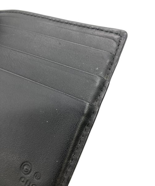 GUCCI（グッチ）GUCCI (グッチ) 札入れ　マイクログッチシマ ブラックの古着・服飾アイテム