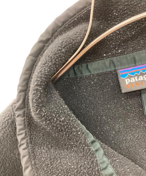 Patagonia SYNCHILLA（パタゴニア シンチラ）Patagonia SYNCHILLA (パタゴニア シンチラ) ハーフスナップフリースプルオーバー ブラック サイズ:Mの古着・服飾アイテム
