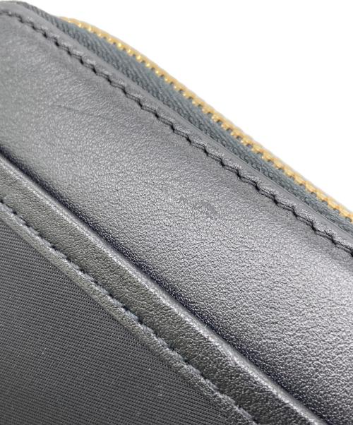 TUMI（トゥミ）TUMI (トゥミ) ラウンドファスナー財布 ブラックの古着・服飾アイテム