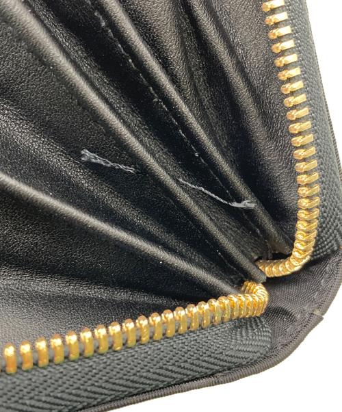 TUMI（トゥミ）TUMI (トゥミ) ラウンドファスナー財布 ブラックの古着・服飾アイテム