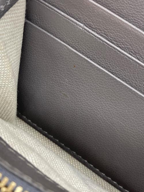 JIMMY CHOO（ジミーチュウ）JIMMY CHOO (ジミーチュウ) スタースタッズラウンドファスナー財布の古着・服飾アイテム