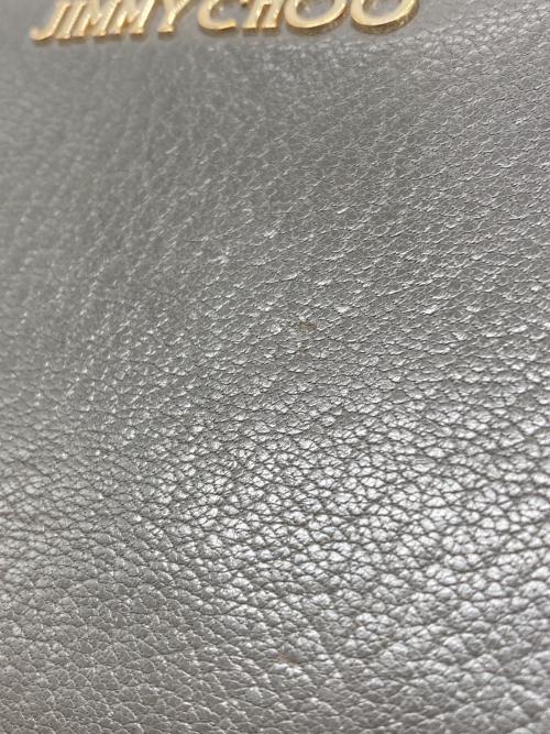 JIMMY CHOO（ジミーチュウ）JIMMY CHOO (ジミーチュウ) スタースタッズラウンドファスナー財布の古着・服飾アイテム