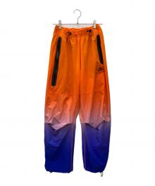 NIKE（ナイキ）の古着「ノーグテックウーブンパンツ」｜オレンジ×ブルー