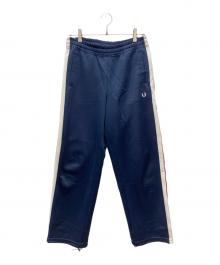 FRED PERRY（フレッドペリー）の古着「トラックパンツ」｜ネイビー