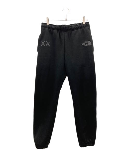 THE NORTH FACE（ザ ノース フェイス）THE NORTH FACE (ザ ノース フェイス) KAWS (カウズ) スウェットロゴパンツ ブラック サイズ:Sの古着・服飾アイテム