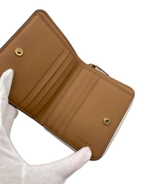 COACH（コーチ）COACH (コーチ) 2つ折り財布の古着・服飾アイテム