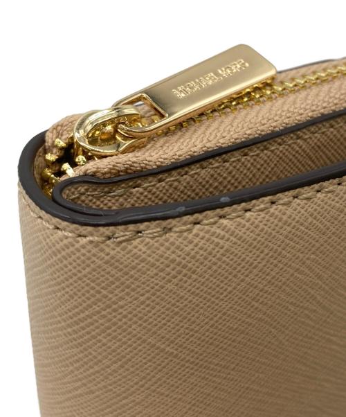 MICHAEL KORS（マイケルコース）MICHAEL KORS (マイケルコース) 2つ折り財布 ベージュの古着・服飾アイテム