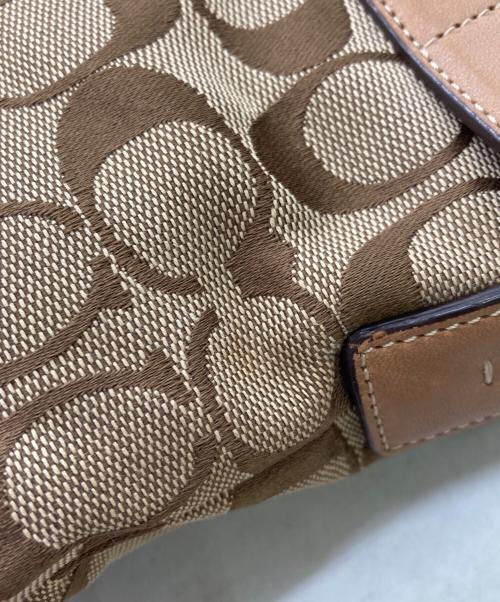 COACH（コーチ）COACH (コーチ) シグネチャー柄 ソーホー ソフトダッフル ショルダーバッグの古着・服飾アイテム