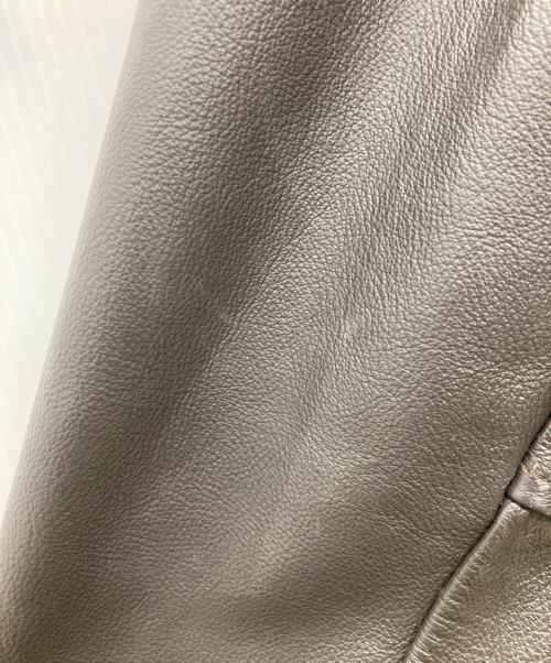 skookum（スクーカム）SKOOKUM (スクーカム) NEPENTHES (ネペンテス) スタジャン オリーブxブラウン サイズ:44の古着・服飾アイテム