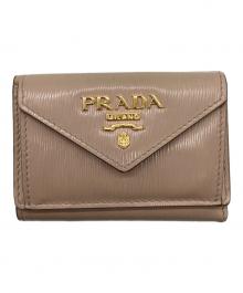 PRADA（プラダ）の古着「3つ折り財布」｜ベージュ