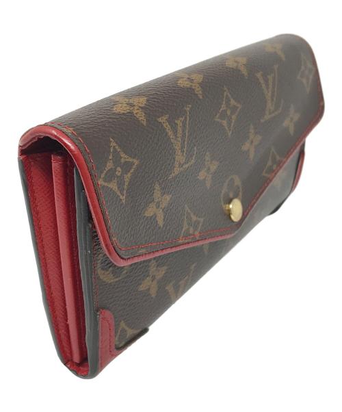 LOUIS VUITTON（ルイ ヴィトン）LOUIS VUITTON (ルイ ヴィトン) 長財布 ポルトフォイユ サラ レティーロ  モノグラム レッド×ブラウン サイズ:実寸サイズにてご確認ください。の古着・服飾アイテム
