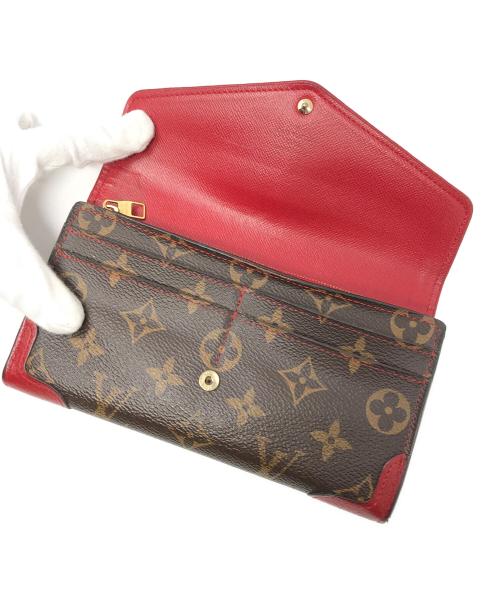 LOUIS VUITTON（ルイ ヴィトン）LOUIS VUITTON (ルイ ヴィトン) 長財布 ポルトフォイユ サラ レティーロ  モノグラム レッド×ブラウン サイズ:実寸サイズにてご確認ください。の古着・服飾アイテム
