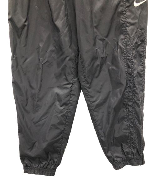 NIKE（ナイキ）NIKE (ナイキ) ナイロンパンツ ブラック サイズ:Lの古着・服飾アイテム