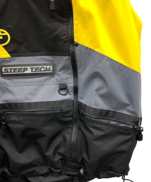 THE NORTH FACE（ザ ノース フェイス）THE NORTH FACE (ザ ノース フェイス) ベスト STEEPTECH ブラック×イエロー サイズ:実寸サイズにてご確認ください。の古着・服飾アイテム