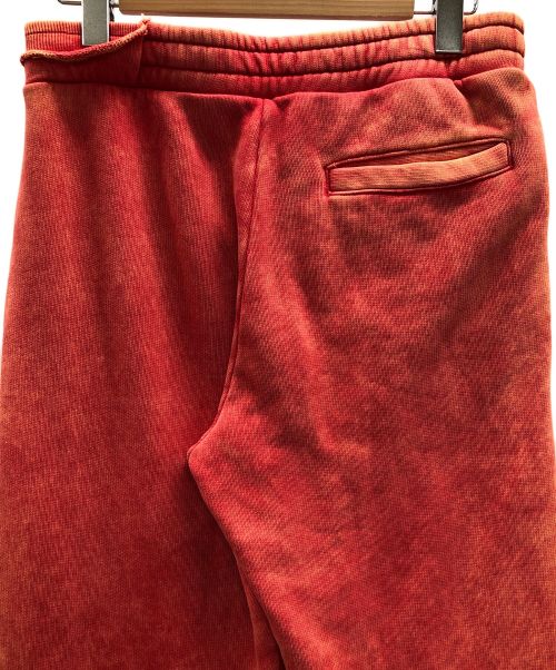 DIESEL（ディーゼル）DIESEL (ディーゼル) ダメージ加工スウェットパンツ カットオフ レイヤード ヴィンテージ加工 フレア スウェットパンツ レッド サイズ:Sの古着・服飾アイテム