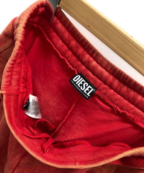 DIESEL（ディーゼル）DIESEL (ディーゼル) ダメージ加工スウェットパンツ カットオフ レイヤード ヴィンテージ加工 フレア スウェットパンツ レッド サイズ:Sの古着・服飾アイテム