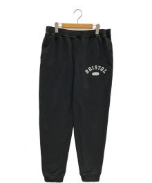 F.C.R.B.（エフシーレアルブリストル）の古着「アーチロゴ スウェットリブパンツ」｜ブラック