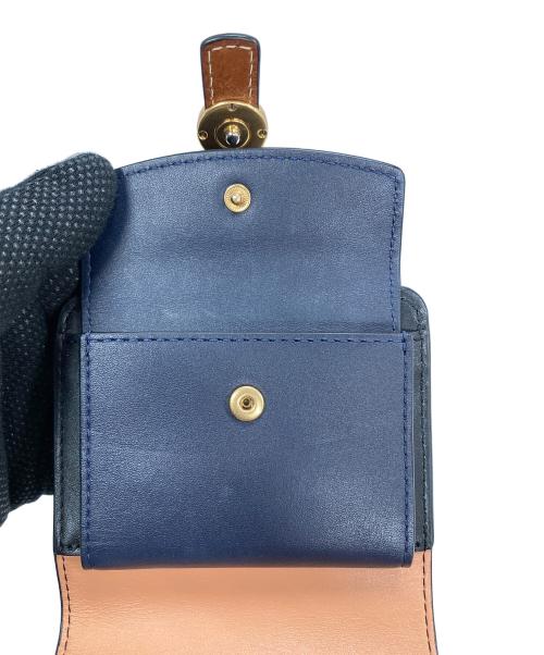 TORY BURCH（トリーバーチ）TORY BURCH (トリーバーチ) 2つ折り財布 ブラック サイズ:実寸サイズにてご確認ください。の古着・服飾アイテム