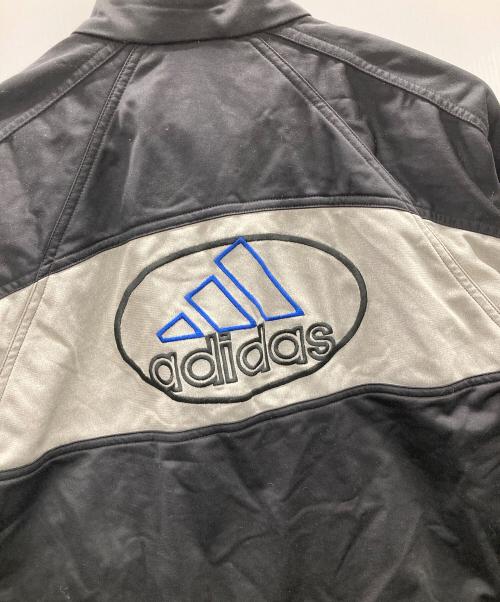 adidas（アディダス）adidas (アディダス) トラックジャケット　刺繍ロゴ ブラック×ブルー サイズ:Mの古着・服飾アイテム