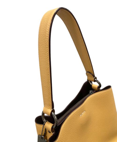 COACH（コーチ）COACH (コーチ) ショルダーバッグ スモール タウン バケット 2WAY（ツーウエイ）ハンドバッグ オレンジ サイズ:実寸サイズにてご確認ください。の古着・服飾アイテム