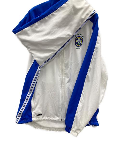NIKE（ナイキ）NIKE (ナイキ) ブラジル 1998 復刻版トラックジャケット ブルー×ホワイト サイズ:Mの古着・服飾アイテム