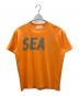 WIND AND SEA（ウィンダンシー）の古着「シャツ」｜オレンジ