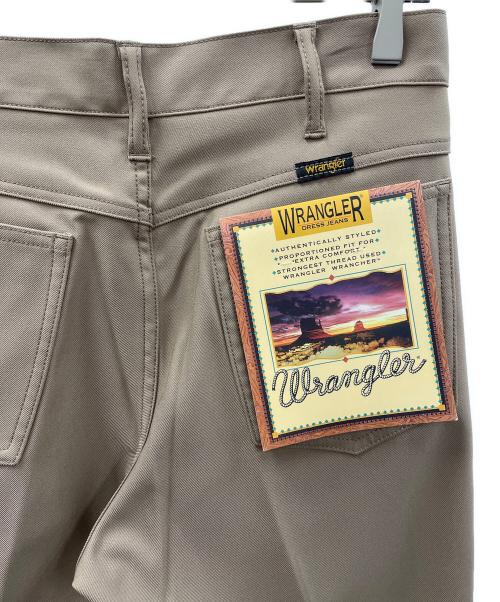 Wrangler（ラングラー）Wrangler (ラングラー) フレアパンツ WRANCHER DRESS（ランチャードレス） ベージュ サイズ:S 未使用品の古着・服飾アイテム