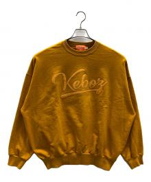 KEBOZ（ケボズ）の古着「スウェット SC ICON LOGO CREWNECK（エスシー アイコン ロゴ クルーネック）」｜オレンジ