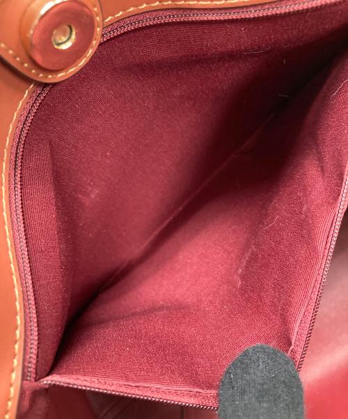 COACH（コーチ）COACH (コーチ) PEANUTS (ピーナッツ) トートバッグ シティ トート・シグネチャー・スヌーピー ウッドストック ブラウン サイズ:実寸サイズにてご確認ください。の古着・服飾アイテム