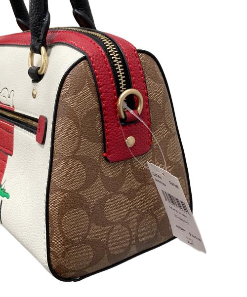 COACH（コーチ）COACH (コーチ) PEANUTS (ピーナッツ) 2WAYバッグ ハンドバッグ ショルダーバッグ スヌーピー ホワイト サイズ:実寸サイズにてご確認ください。 未使用品の古着・服飾アイテム