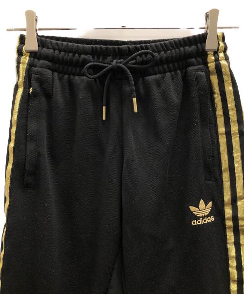 adidas（アディダス）adidas (アディダス) トラックパンツ　オリジナル スーパースター ブラック×ゴールド サイズ:XSの古着・服飾アイテム