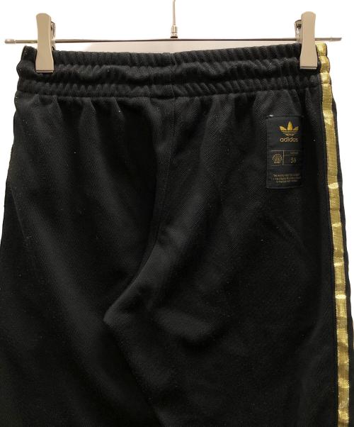 adidas（アディダス）adidas (アディダス) トラックパンツ　オリジナル スーパースター ブラック×ゴールド サイズ:XSの古着・服飾アイテム